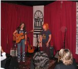 Emily Saliers announcing meike at Eddie's Attic in Decatur at a benefit concert for Caroline Aiken 2005